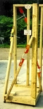 Scroogeclamp set inside a tall wood frame